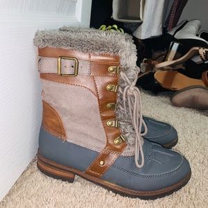 Brown and blue fuzzy boots